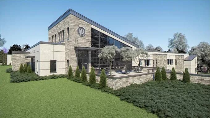 The Westland Bunker — exterior view showing the stone facade and glass atrium