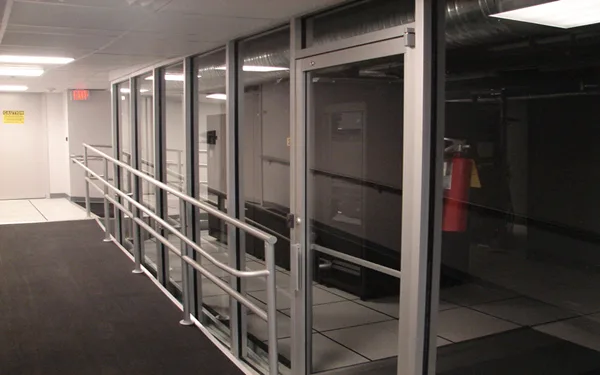 Server cages and access hallway inside the data center